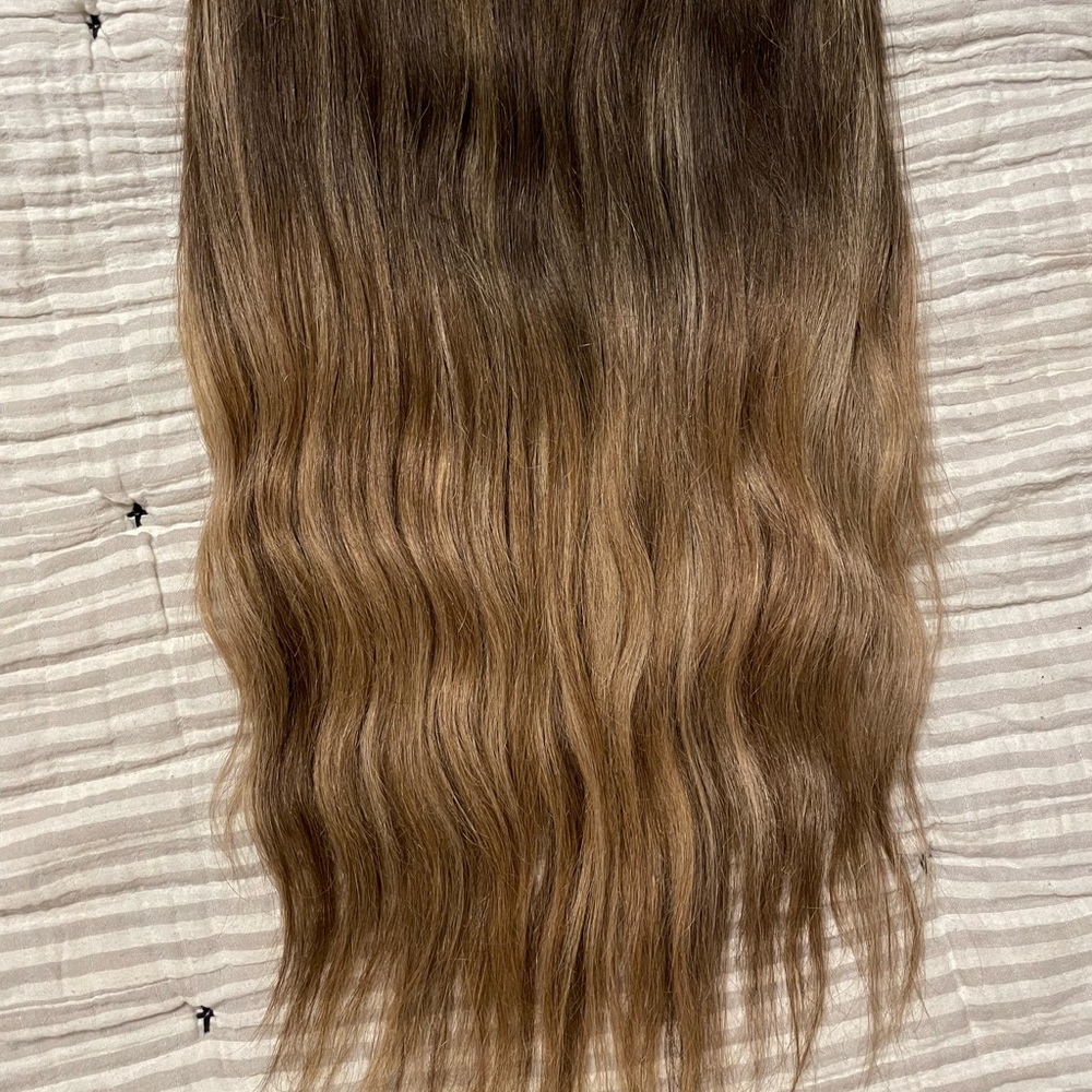 Halo couture extensions, 18 inch layered and trimmed. Real human hair